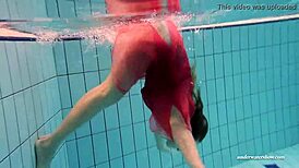 Feeling the thrill of firm tits in red dress underwater
