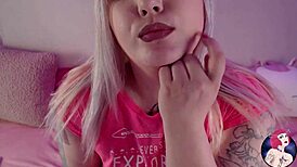 Hot girl with huge boobs camming and posing seductively.