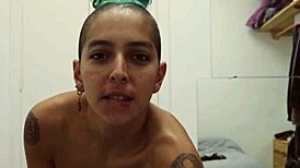 omg, short tattooed girl with green hair doin a hot striptease...