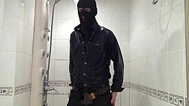 Master In Blue Jeans Washes Feet In Bathroom