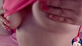 Hot girl with huge boobs camming and posing seductively.