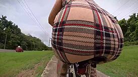 Exhibitionist bike ride with a butt plug, neighbor watching?