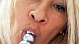 Naked milf plays with dildo in her pussy.