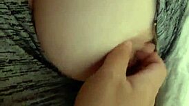 Playing with my wife's amazing natural 42f tits, oiled and big.