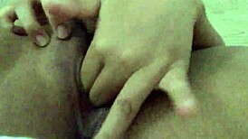 young asian woman starts her morning with intimate fingering, building to orgasm