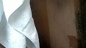 petite asian girl takes a relaxing shower at home