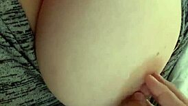 Playing with my wife's amazing natural 42f tits, oiled and big.