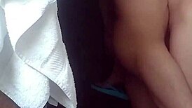 petite asian girl takes a relaxing shower at home