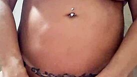 Naked milf plays with dildo in her pussy.