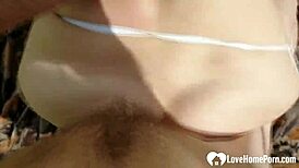 Horny chick bends over for doggystyle sex outdoors, riding cock in public sex tape.