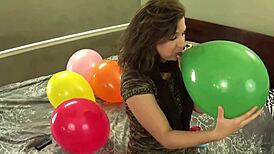 blowing balloons popping them while chewing bubblegum