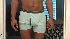 In this workout session, a cute mature woman barefoot in stockings performs solo exercises