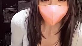Stunning Asian ladyboy masturbates live on camera in private session.