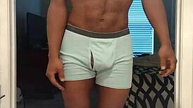 In this workout session, a cute mature woman barefoot in stockings performs solo exercises