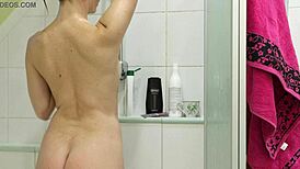 hid the phone in the shower to catch my stepmother’s sexy redhead body.