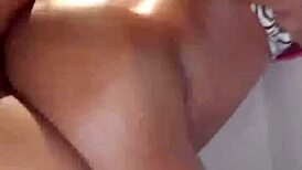 Watch the black woman in real couple performing sexy blowjob and oiled fucking