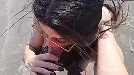 Hot brunette couple ise mah performs blowjob and fucking on public beach