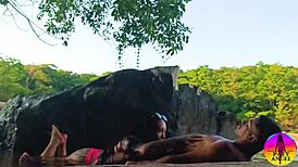 In the trailer, the brunette dances before getting banged by her lover in the public river, ending with cum in mouth.