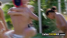 Busty brunette participates in swinger orgy with big cock