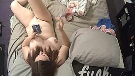 Huge titted milf with landing strip pussy smokes naked.