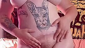 naked woman dances erotically with lotion on her big wet pussy