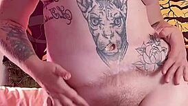 naked woman dances erotically with lotion on her big wet pussy