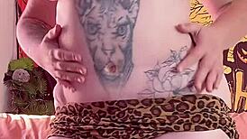 naked woman dances erotically with lotion on her big wet pussy