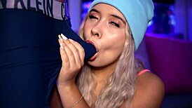 Horny blonde with a cute face stimulates her boyfriend's cock with her boxers on!