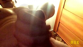 alone at home, young guy masturbates his monster cock.