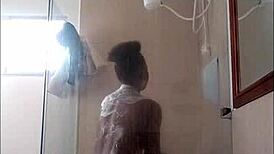 Ebony milf drops dildo in shower blowjob