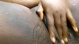 an ebony girl in a private setting