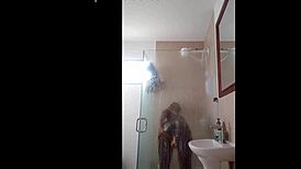 Ebony milf drops dildo in shower blowjob