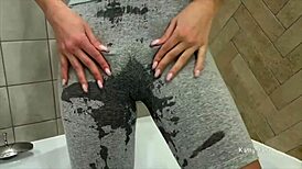 So this teen just peed right in her shorts, wet pussy, ass, and legs in the bathroom. Crazy scene!