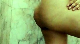 watch this asian babe dirty talk while masturbating big natural tits in the bathroom?