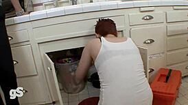 sexy lesbian plumber girl dives into hot milf's wet pussy for steamy action.