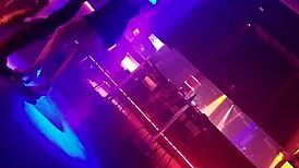 Gogo dancer invites married brunette to dance and lifts her dress