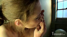 felicity flexes her shaved pussy while sucking toes with her tongue