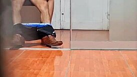 Hidden cam catches the secretary in her office routine