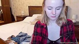 blonde teen camgirl teases in see through bra on webcam