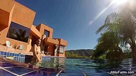 Abigail Mac Relaxes by the Pool in Nude Fun