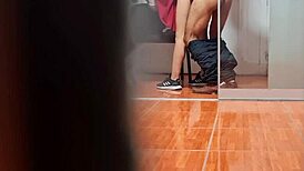 Hidden cam catches the secretary in her office routine