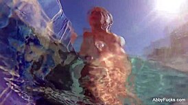 Abigail Mac Relaxes by the Pool in Nude Fun