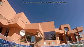 Abigail Mac Relaxes by the Pool in Nude Fun