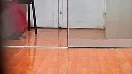 Hidden cam catches the secretary in her office routine