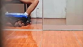 Hidden cam catches the secretary in her office routine