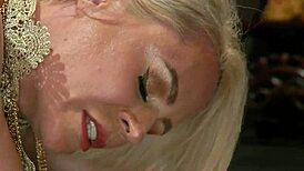 Blonde milf bows to shemale domme for kinky control