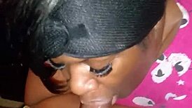 Ebony amateur gives sloppy blowjob to big black cock at bedtime