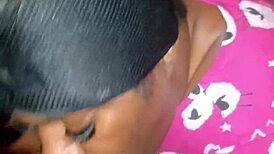 Ebony amateur gives sloppy blowjob to big black cock at bedtime