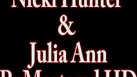 Julia Ann fingers Nicki Hunter's pussy in lesbian play.