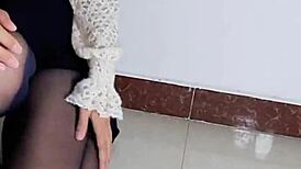 Siganjue Prepares in Front of the Mirror Before Work